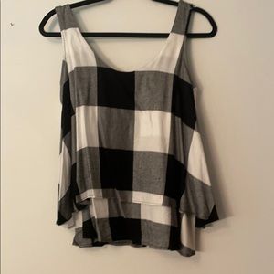 Black and white sleeveless blouse